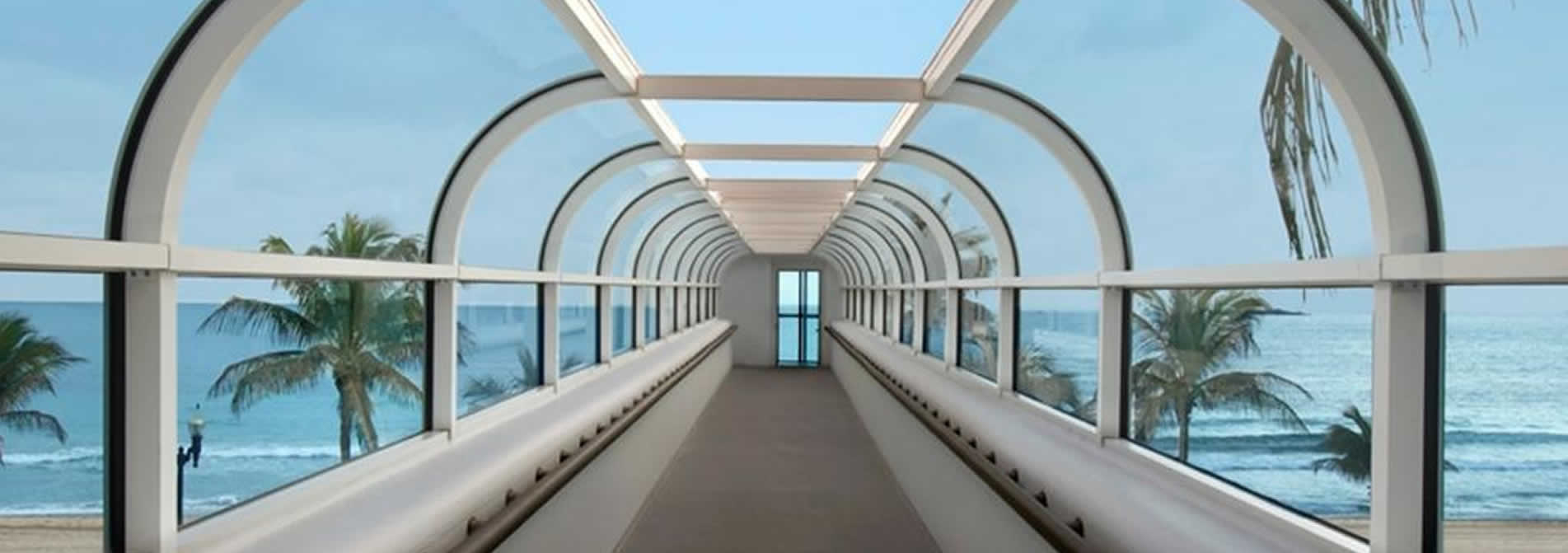 https://travelreservationdesk.com/staging/wp-content/uploads/2016/05/fort-lauderdal-hotels-walk-way-to-the-beach-1903x671.jpg
